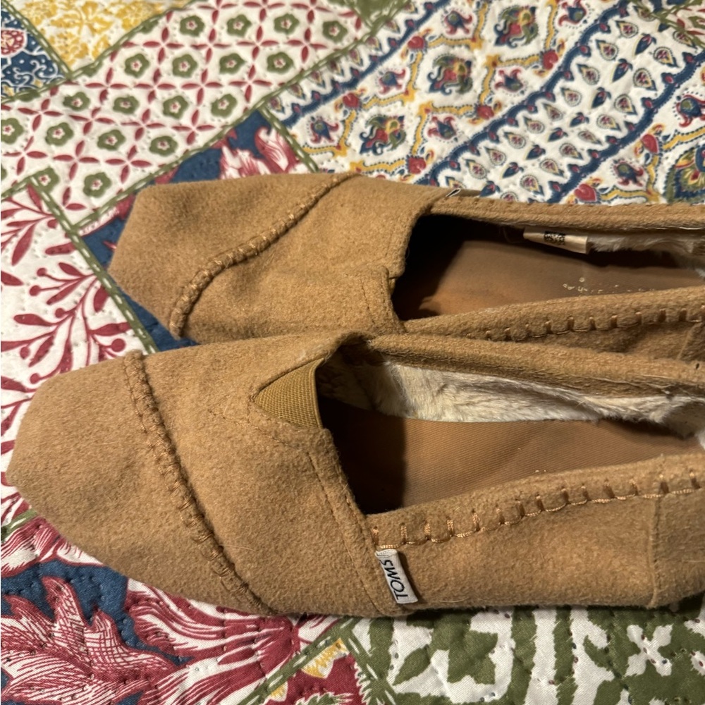 Toms felt shoes.